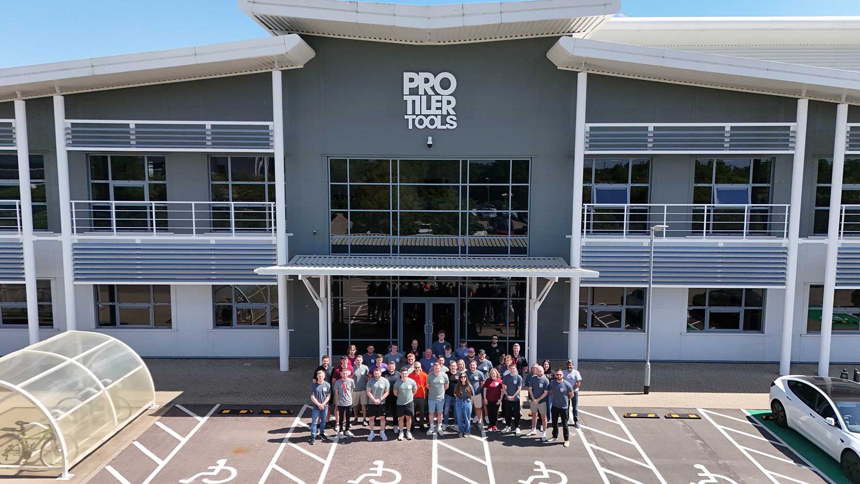 Pro Tiler Tools team outside the company's headquarters at Prologis Park Pineham in Northampton