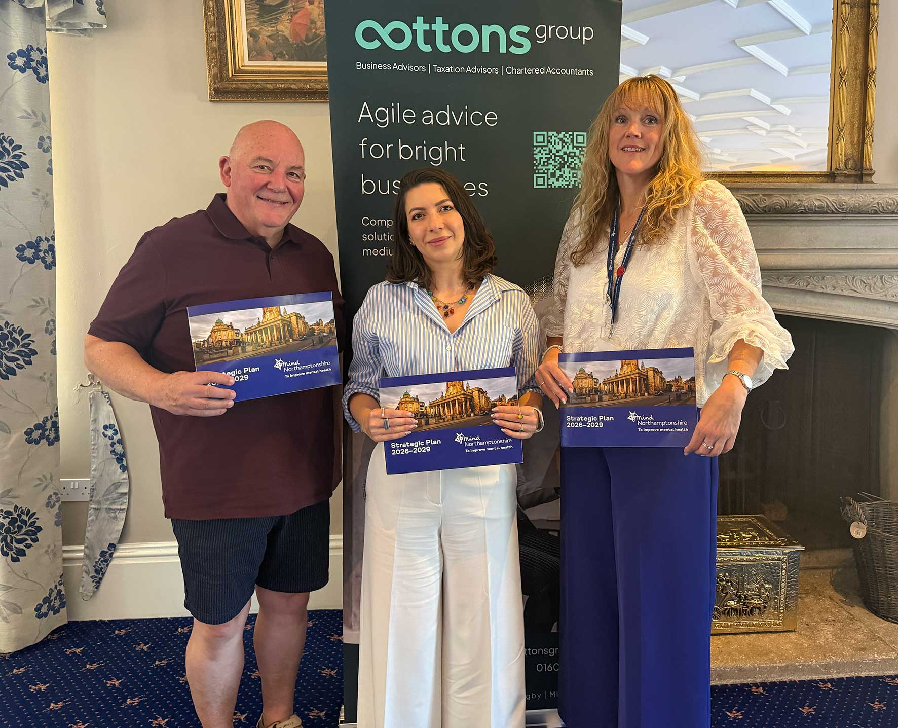 Ian Taylor, Ana Dima and Northamptonshire Mind CEO Sarah Hillier with the charity’s Strategic Plan