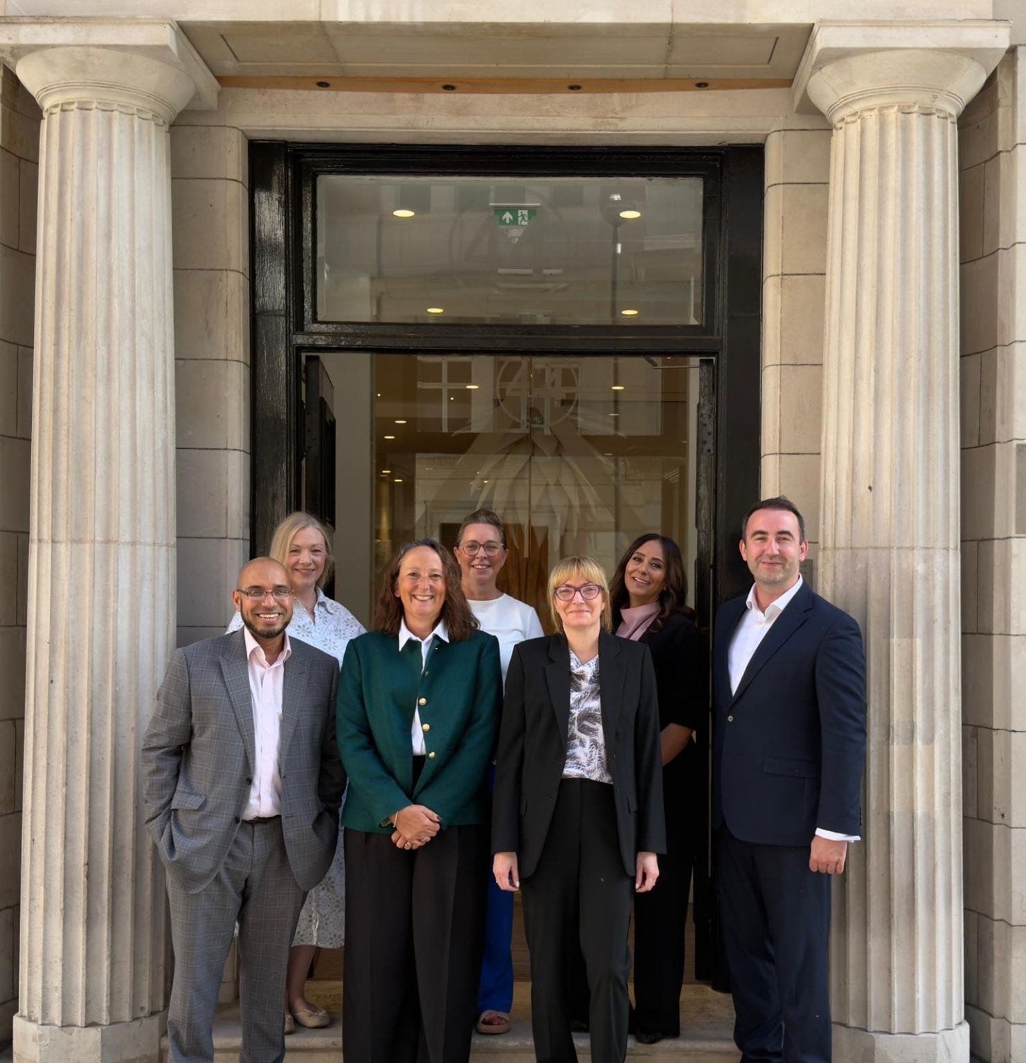 BMTC Law team outside the firm’s new London office at 44 Southampton Buildings.