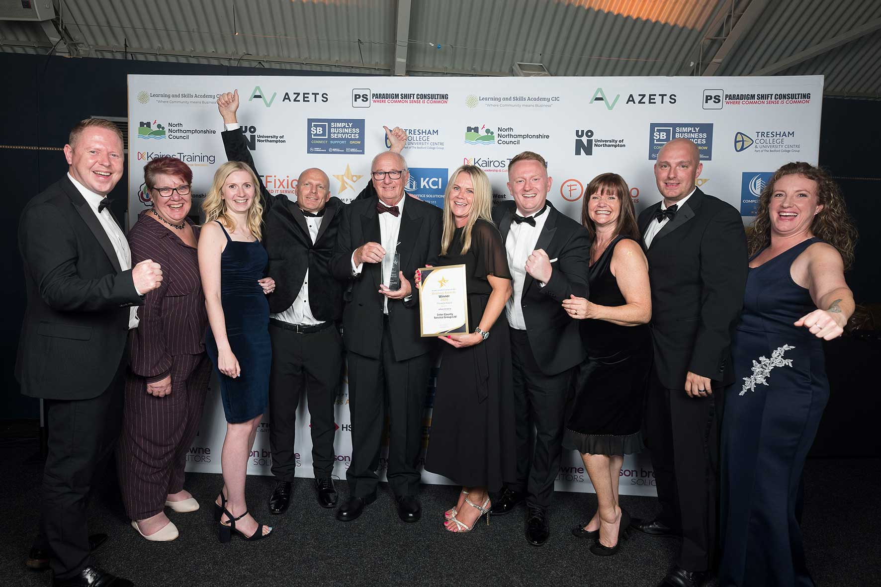 Inter County Service Group representatives celebrate with their award at the Northamptonshire Business Awards.